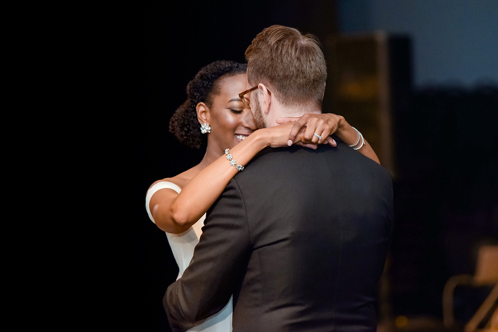 A fall wedding with burgundy, dusty rose and grey details. The guests partied on a black dance floor with a live band throughout the autumn celebration! Mikkel Paige Photography, photographer in Greenville NC and Raleigh, captured this wedding at Rock Springs Center, planned by @vivalevent. Click through for more details and pictures from their day! #mikkelpaige NCwedding #northcarolinawedding #southernwedding #weddingreception #burgundywedding