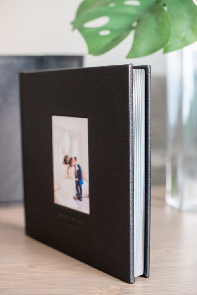 Photos from a destination wedding at Eau Palm Beach in Florida, by Mikkel Paige Photography, are beautifully displayed. The bride and groom chose a black leather 12x12