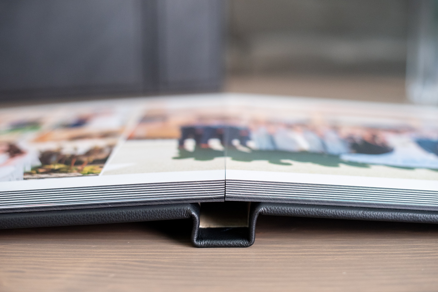 Photos from a destination wedding at Eau Palm Beach in Florida, by Mikkel Paige Photography, are beautifully displayed. The bride and groom chose a black leather 12x12