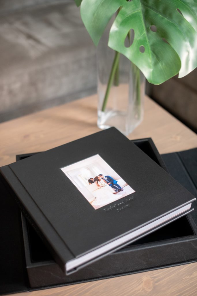 Photos from a destination wedding at Eau Palm Beach in Florida, by Mikkel Paige Photography, are beautifully displayed. The bride and groom chose a black leather 12x12