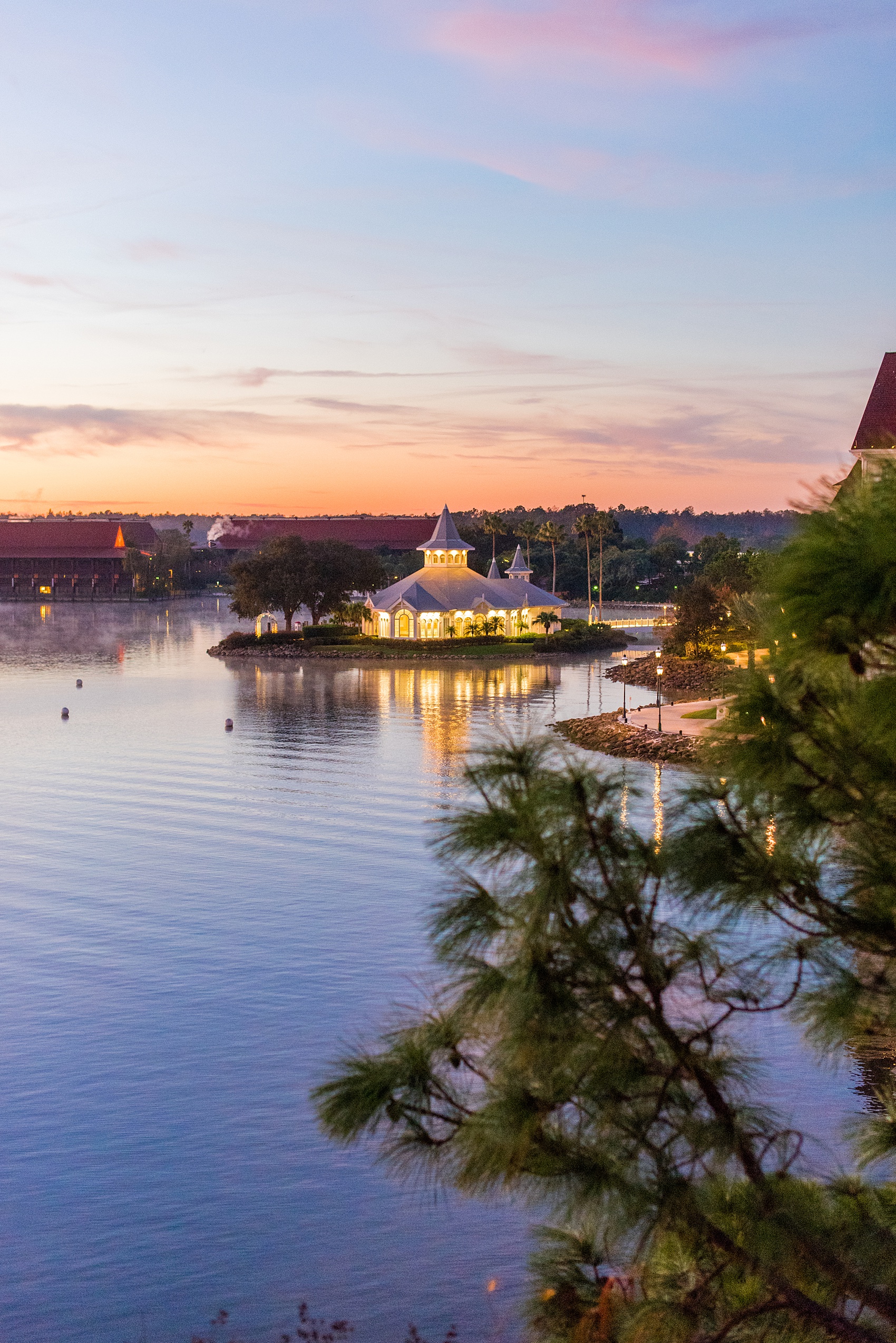 Photographs of a Walt Disney World wedding by Mikkel Paige Photography. The bride and groom got ready for their small wedding pavilion ceremony at the Grand Floridian, took photos at the garden and with the castle and went to their awesome reception at the Contemporary resort. This beautiful December wedding will give you ideas for a fun celebration outside of the parks. #disneywedding #disneybride #waltdisneyworld #DisneyWorldWedding #GrandFloridianResort