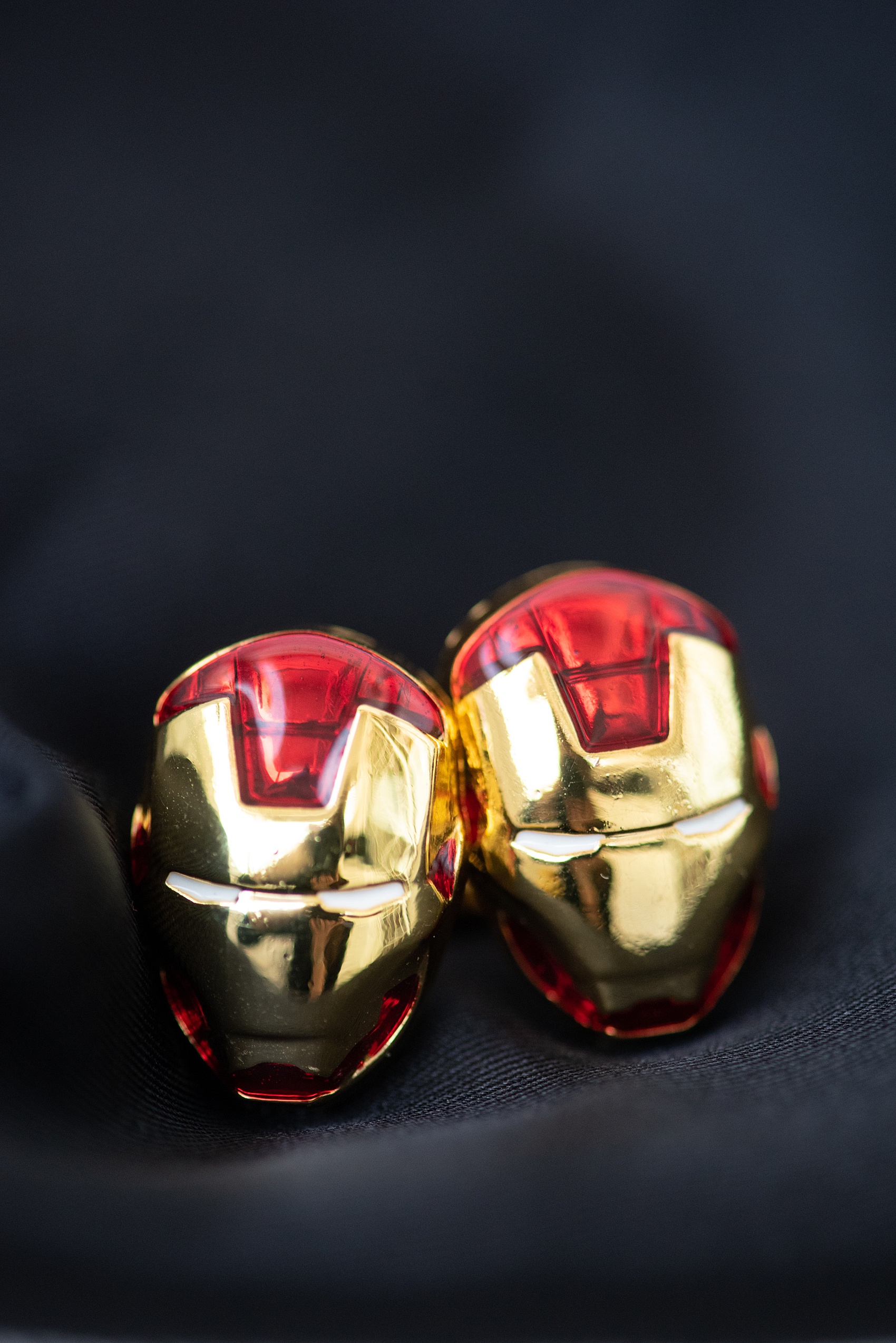 Photographs of a Walt Disney World groom by Mikkel Paige Photography. As a lover of Marvel comics, he wove a small detail from Iron Man into his white tuxedo with gold and red cufflinks. He got ready for his day at the dream resort, the Grand Floridian, with his groomsmen and wore a red rose boutonniere for his bride’s love of a Beauty and the Beast theme. #disneywedding #disneybride #waltdisneyworld #DisneyWorldWedding