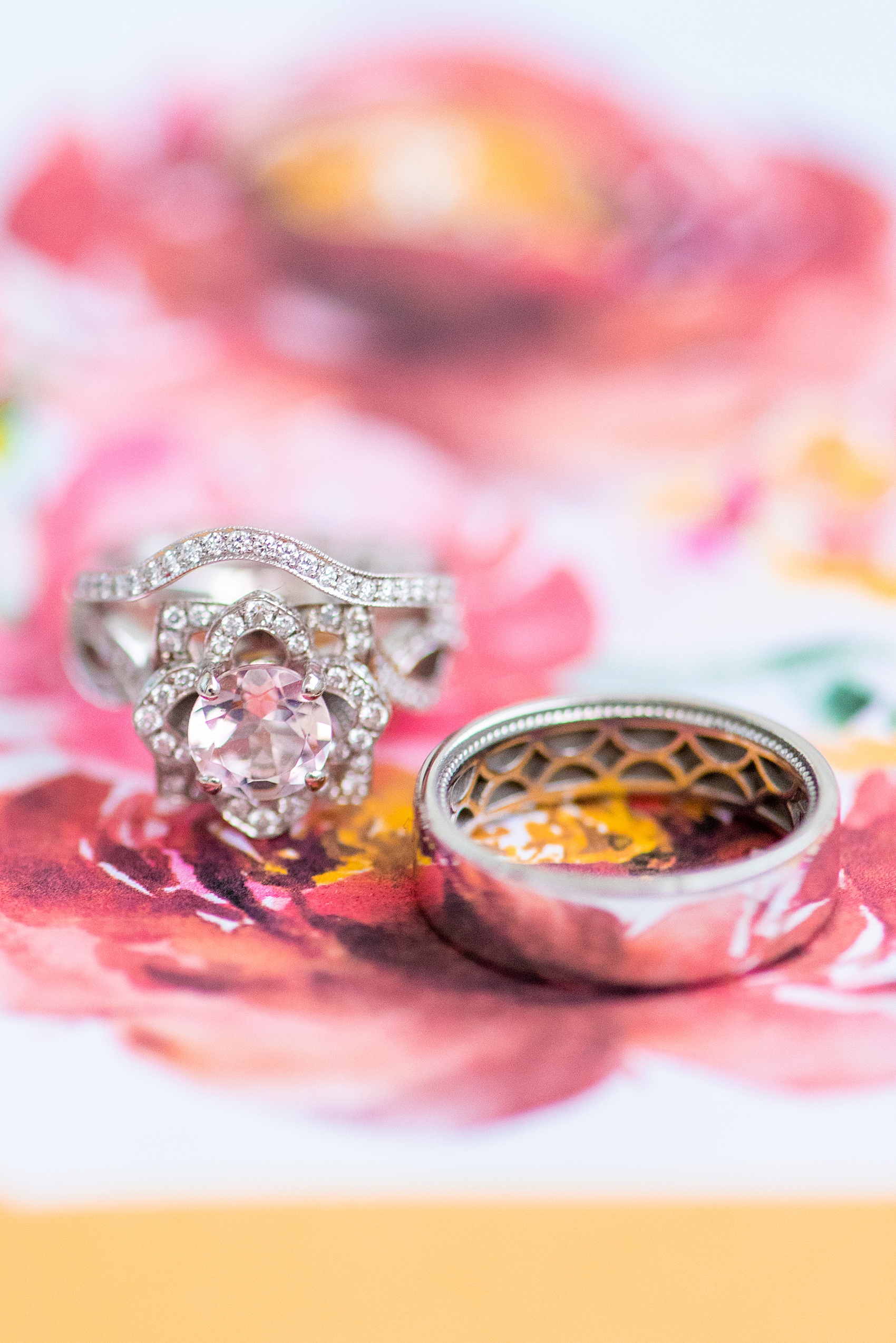 Photographs of a Walt Disney World wedding by Mikkel Paige Photography. The bride’s engagement ring was themed to Beauty and the Beast with a pink morganite center stone. It perfectly matched their invitations with Cinderella Castle as the main watercolor and the movie glass rose dome on the RSVP card. #disneywedding #disneybride #waltdisneyworld #DisneyWorldWedding #morganitering #pinkengagementring #rosering #BeautyandtheBeast