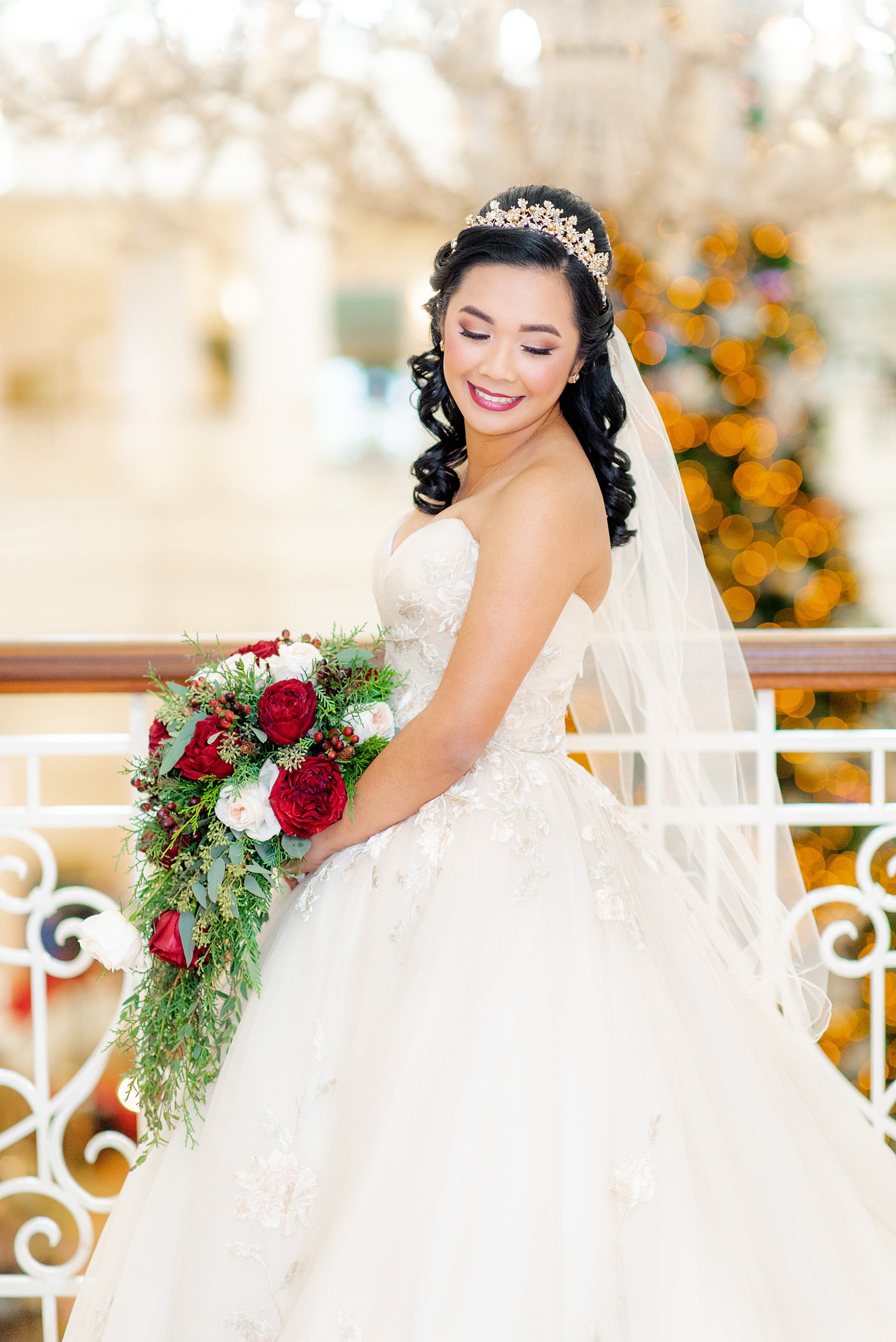 Photographs of a Walt Disney World bride by Mikkel Paige Photography. As a lover of Beauty and the Beast, the bride wove details from the classic Disney film into her wedding. Her beautiful rose embroidered dress was befitting of a princess. She got ready for her day at the dream resort, the Grand Floridian. Her hair was twisted into a fun, rose bun. #disneywedding #disneybride #waltdisneyworld #DisneyWorldWedding