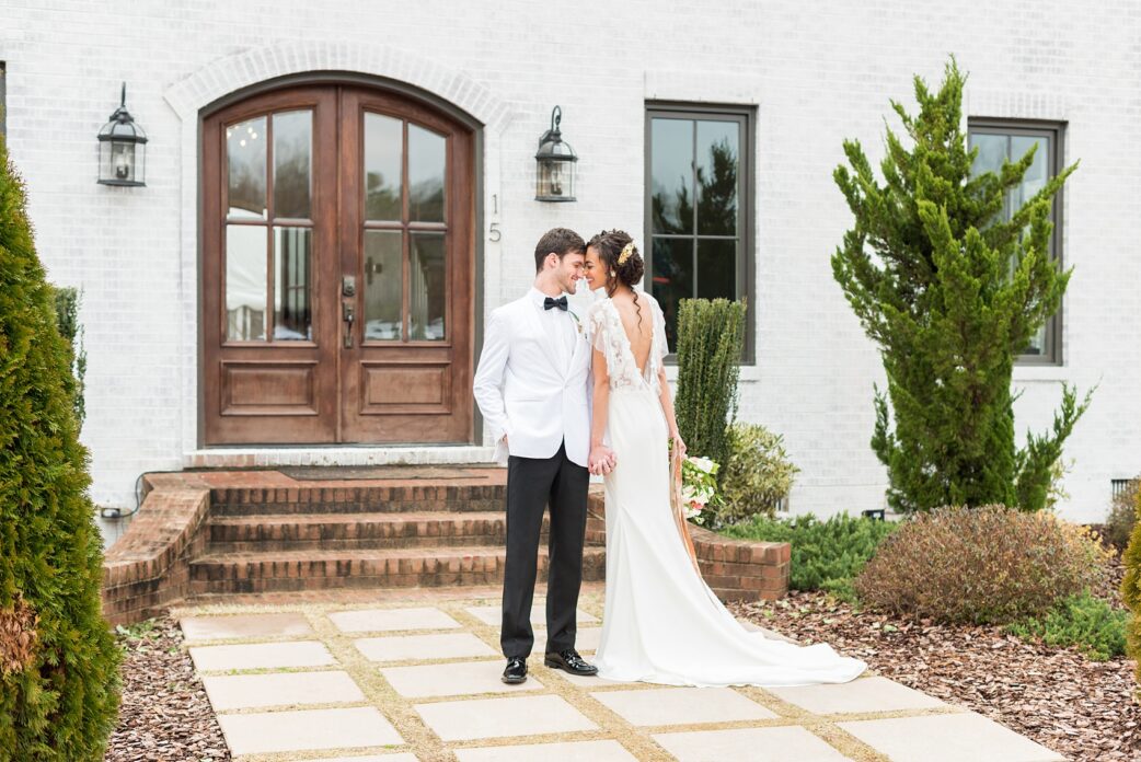 The Bradford NC Photos captured by Mikkel Paige Photography. This North Carolina Raleigh event venue has beautiful gardens and is perfect for outdoor or indoor ceremonies and receptions. Design by @vivalevent with a green, black and peach palette. #mikkelpaige #brideandgroom #Raleighweddingphotographer #raleighweddingvenues