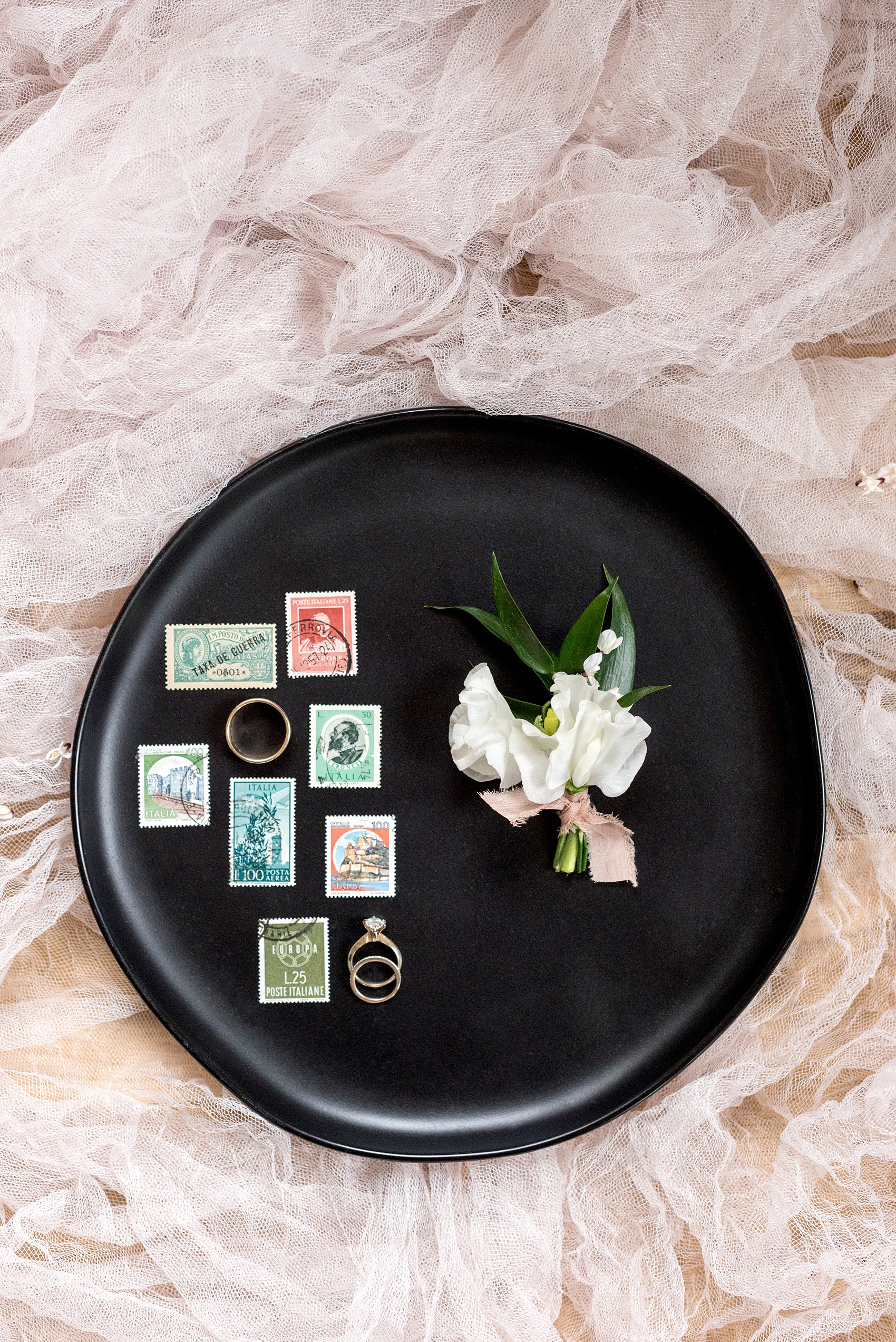 The Bradford NC Photos captured by Mikkel Paige Photography. This North Carolina Raleigh event venue has beautiful gardens and is perfect for outdoor or indoor ceremonies and receptions. Design by @vivalevent with a green, black and peach palette. Sweet pea boutonniere by New Creations Flowers. #mikkelpaige #vintagestamps #ringshots #Raleighweddingphotographer #raleighweddingvenues