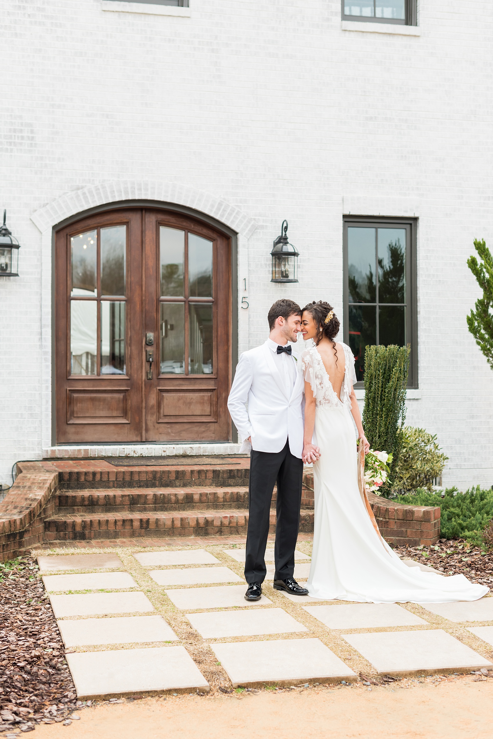 The Bradford NC Photos captured by Mikkel Paige Photography. This North Carolina Raleigh event venue has beautiful gardens and is perfect for outdoor or indoor ceremonies and receptions. Design by @vivalevent with a green, black and peach palette. #mikkelpaige #brideandgroom #Raleighweddingphotographer #raleighweddingvenues