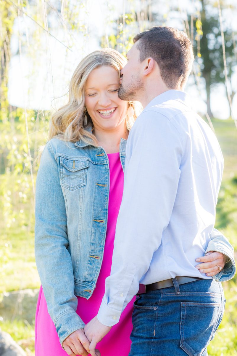 Beautiful pictures of an engagement session at the North Carolina Museum of Art, NCMA by Raleigh North Carolina wedding photographer, Mikkel Paige Photography. They brought their Golden Doodle dog for extra fun and we captured the Cherry Blossoms during a spring photoshoot. | Raleigh Engagement Photographer | #mikkelpaige #RaleighEngagementPhotographer #RaleighEngagementPhotographs