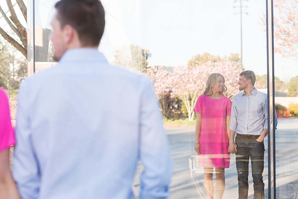 Beautiful pictures of an engagement session at the North Carolina Museum of Art, NCMA by Raleigh North Carolina wedding photographer, Mikkel Paige Photography. They brought their Golden Doodle dog for extra fun and we captured the Cherry Blossoms during a spring photoshoot. | Raleigh Engagement Photographer | #mikkelpaige #RaleighEngagementPhotographer #RaleighEngagementPhotographs