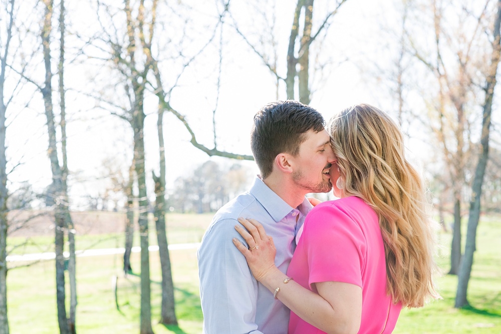 Beautiful pictures of an engagement session at the North Carolina Museum of Art, NCMA by Raleigh North Carolina wedding photographer, Mikkel Paige Photography. They brought their Golden Doodle dog for extra fun and we captured the Cherry Blossoms during a spring photoshoot. | Raleigh Engagement Photographer | #mikkelpaige #RaleighEngagementPhotographer #RaleighEngagementPhotographs