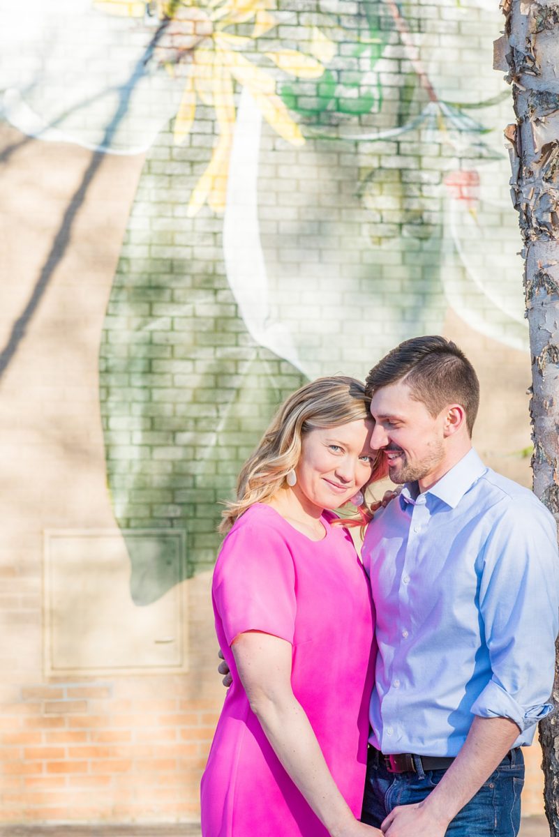 Beautiful pictures of an engagement session at the North Carolina Museum of Art, NCMA by Raleigh North Carolina wedding photographer, Mikkel Paige Photography. They brought their Golden Doodle dog for extra fun and we captured the Cherry Blossoms during a spring photoshoot. | Raleigh Engagement Photographer | #mikkelpaige #RaleighEngagementPhotographer #RaleighEngagementPhotographs