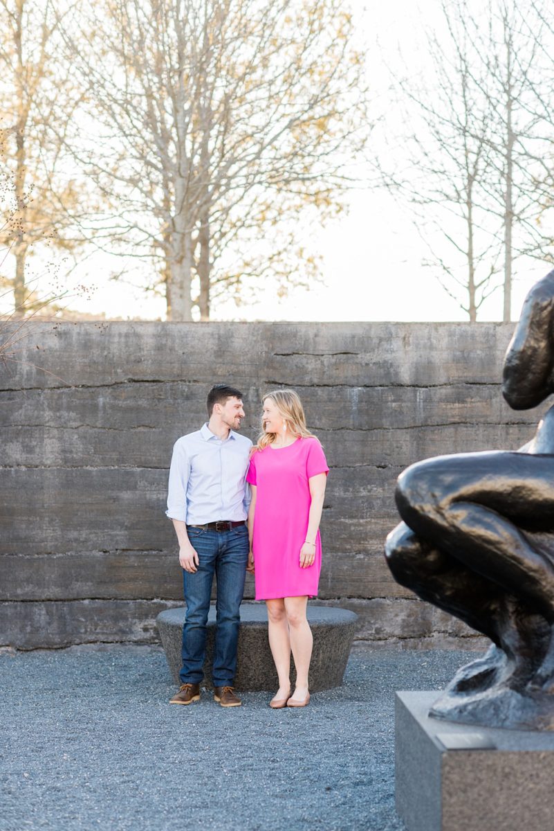 Beautiful pictures of an engagement session at the North Carolina Museum of Art, NCMA by Raleigh North Carolina wedding photographer, Mikkel Paige Photography. They brought their Golden Doodle dog for extra fun and we captured the Cherry Blossoms during a spring photoshoot. | Raleigh Engagement Photographer | #mikkelpaige #RaleighEngagementPhotographer #RaleighEngagementPhotographs