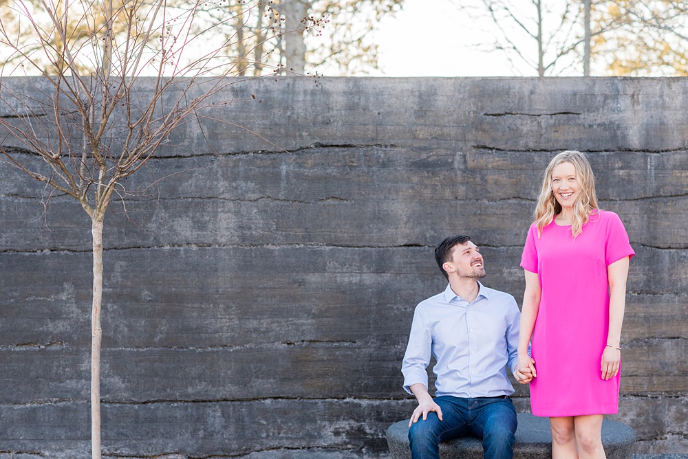 Beautiful pictures of an engagement session at the North Carolina Museum of Art, NCMA by Raleigh North Carolina wedding photographer, Mikkel Paige Photography. They brought their Golden Doodle dog for extra fun and we captured the Cherry Blossoms during a spring photoshoot. | Raleigh Engagement Photographer | #mikkelpaige #RaleighEngagementPhotographer #RaleighEngagementPhotographs