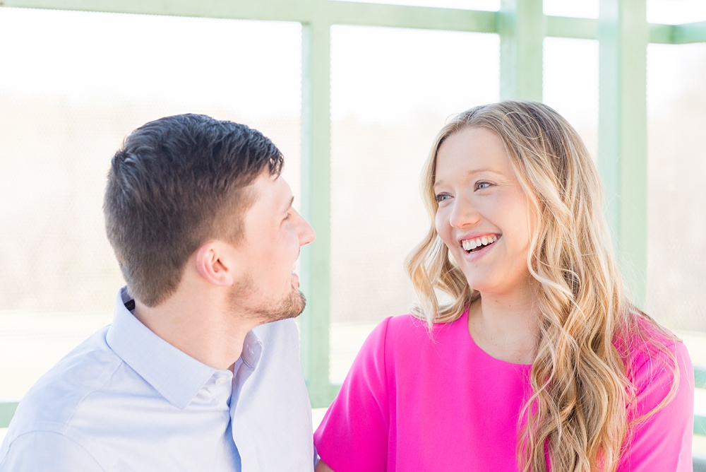 Beautiful pictures of an engagement session at the North Carolina Museum of Art, NCMA by Raleigh North Carolina wedding photographer, Mikkel Paige Photography. They brought their Golden Doodle dog for extra fun and we captured the Cherry Blossoms during a spring photoshoot. | Raleigh Engagement Photographer | #mikkelpaige #RaleighEngagementPhotographer #RaleighEngagementPhotographs