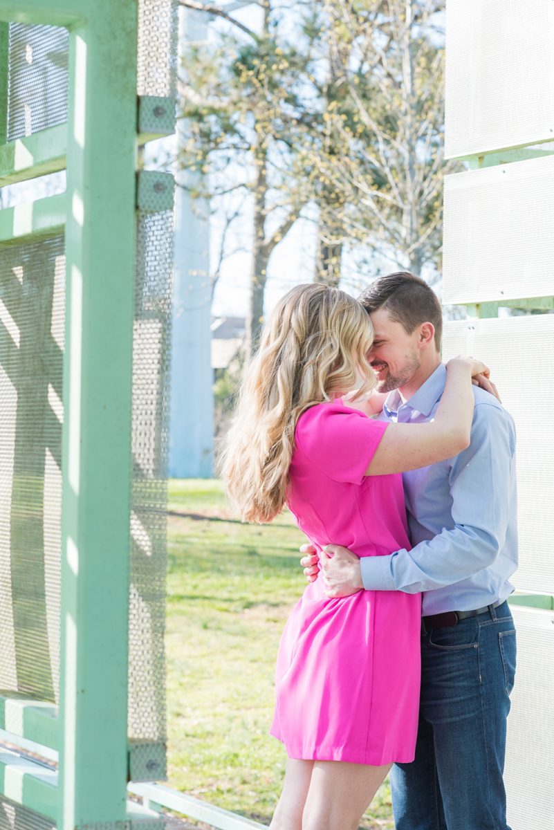 Beautiful pictures of an engagement session at the North Carolina Museum of Art, NCMA by Raleigh North Carolina wedding photographer, Mikkel Paige Photography. They brought their Golden Doodle dog for extra fun and we captured the Cherry Blossoms during a spring photoshoot. | Raleigh Engagement Photographer | #mikkelpaige #RaleighEngagementPhotographer #RaleighEngagementPhotographs