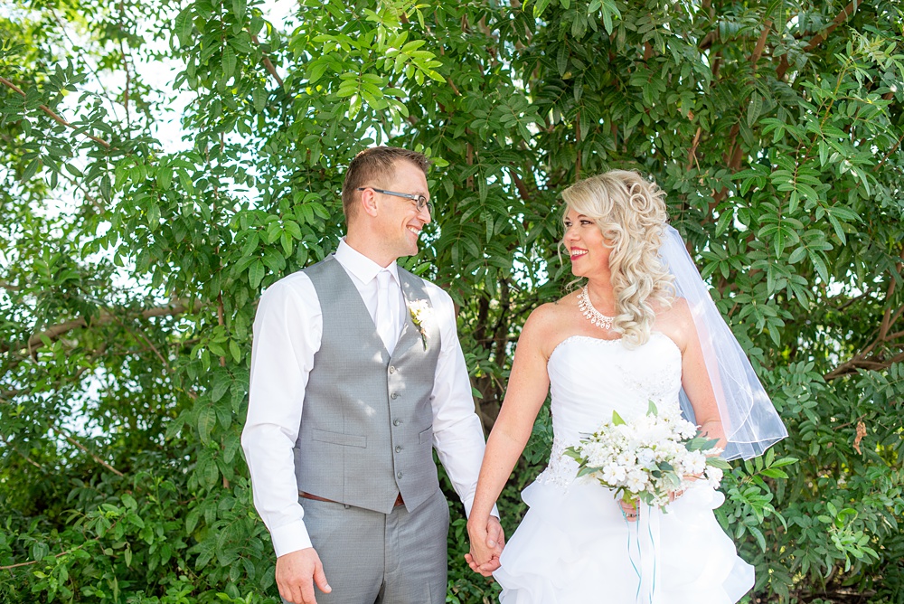 Hub 925 wedding photos at an alternative Orlando wedding venue by Mikkel Paige Photography. The bride and groom kiss near Little Sand Lake near Universal theme park. #mikkelpaige #hub925 #orlandoweddingphotographer #orlandoweddingphotos #floridaweddingphotographer #centralfloridawedding #orlandoweddingvenue