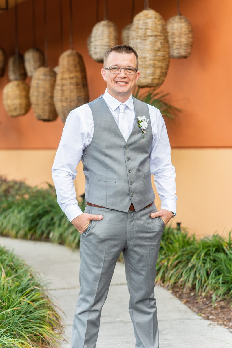 Hub 925 wedding photos at an alternative Orlando wedding venue by Mikkel Paige Photography. The groom wore a grey vest instead of a suit or tuxedo at his April celebration near Universal theme park. #mikkelpaige #hub925 #orlandoweddingphotographer #orlandoweddingphotos #floridaweddingphotographer #centralfloridawedding #orlandoweddingvenue #groomstyle