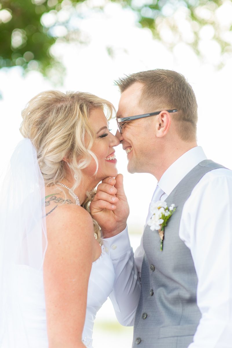 Hub 925 wedding photos at an alternative Orlando wedding venue by Mikkel Paige Photography. The bride and groom kiss near Little Sand Lake near Universal theme park. #mikkelpaige #hub925 #orlandoweddingphotographer #orlandoweddingphotos #floridaweddingphotographer #centralfloridawedding #orlandoweddingvenue