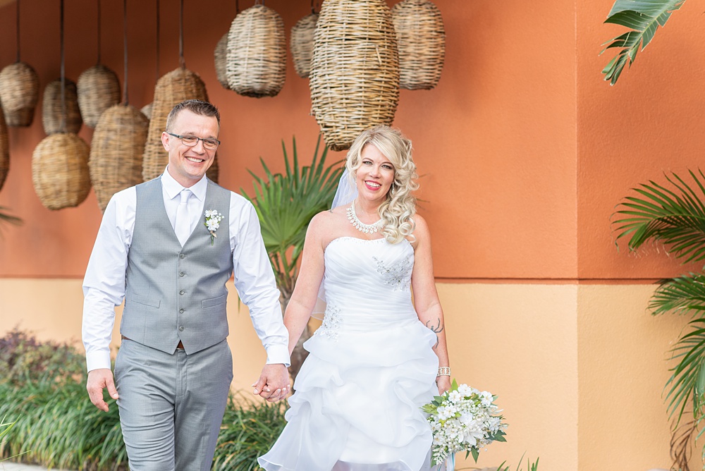 Hub 925 wedding photos at an alternative Orlando wedding venue by Mikkel Paige Photography. The bride and groom posed for photos after their first look at their April celebration near Universal theme park. #mikkelpaige #hub925 #orlandoweddingphotographer #orlandoweddingphotos #floridaweddingphotographer #centralfloridawedding #orlandoweddingvenue #brideandgroom