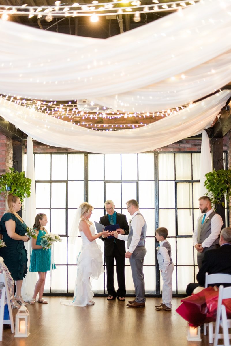 Hub 925 wedding photos at an alternative Orlando wedding venue by Mikkel Paige Photography. The bride and groom said their vows in this workspace venue near Universal theme park. #mikkelpaige #hub925 #orlandoweddingphotographer #orlandoweddingphotos #floridaweddingphotographer #centralfloridawedding #orlandoweddingvenue #weddingceremony #simpleweddingceremonysetup