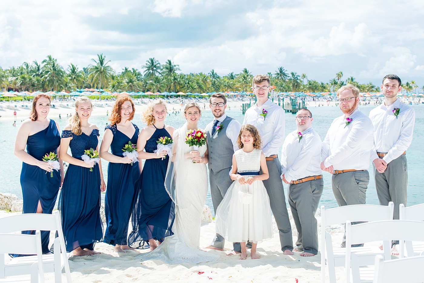 Disney Cruise Line wedding photos at Castaway Cay and inside the Dream by Mikkel Paige Photography. #mikkelpaige #disneybrides #disneycouple #disneycruiselinewedding #disneycruiseline #DCLwedding #beachwedding #weddingparty