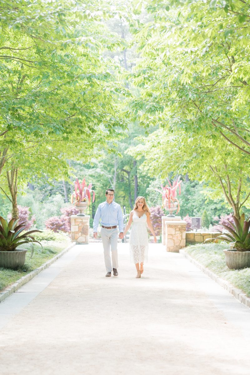 Duke Gardens engagement photos in Durham, North Carolina, by Mikkel Paige Photography. Trees with leaves in full bloom during spring reveal themselves for a May session. #DurhamPhotographer #DurhamWeddingPhotographer #SarahPDukeGardens #DukeGardens #DurhamEngagementSession