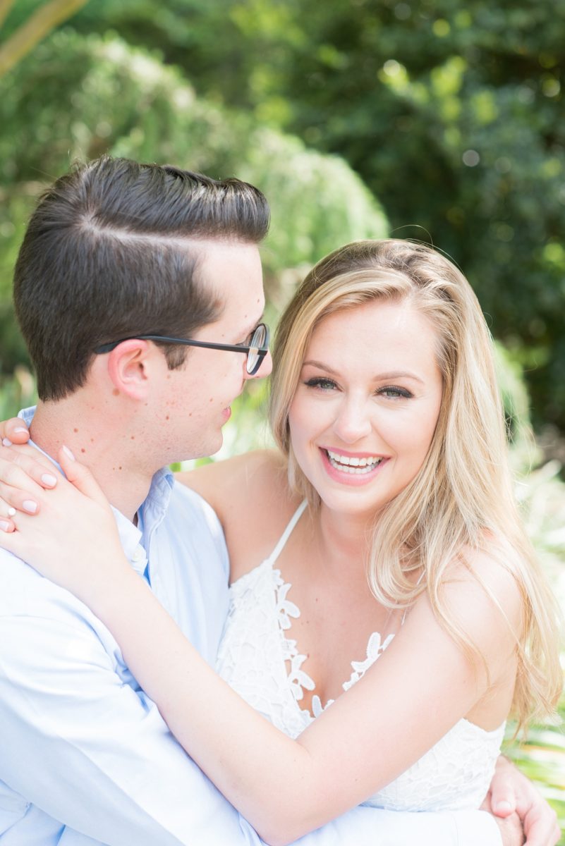 Duke Gardens engagement photos in Durham, North Carolina, by Mikkel Paige Photography. Trees with leaves in full bloom during spring reveal themselves for a May session. #DurhamPhotographer #DurhamWeddingPhotographer #SarahPDukeGardens #DukeGardens #DurhamEngagementSession