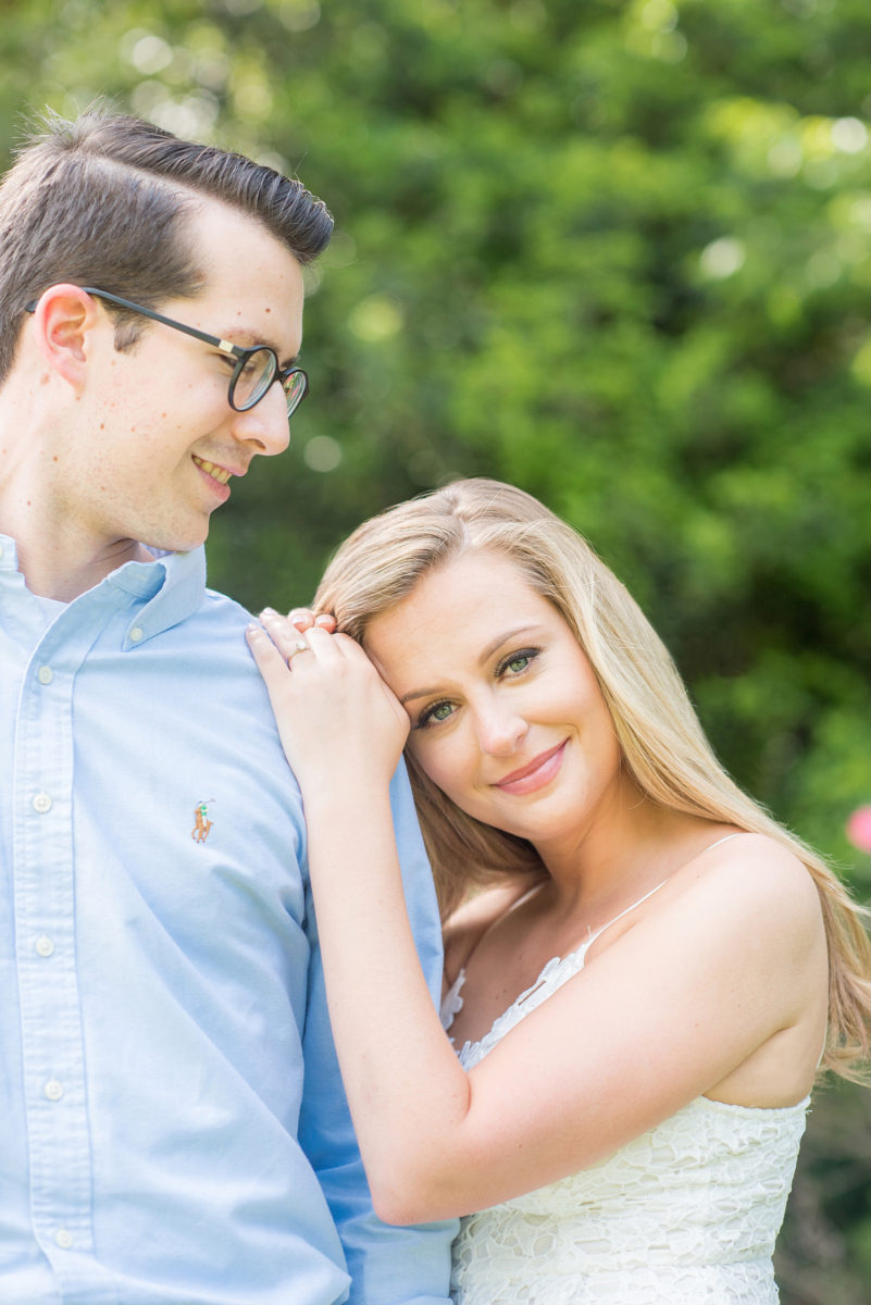 Duke Gardens engagement photos in Durham, North Carolina, by Mikkel Paige Photography. Trees with leaves in full bloom during spring reveal themselves for a May session. #DurhamPhotographer #DurhamWeddingPhotographer #SarahPDukeGardens #DukeGardens #DurhamEngagementSession