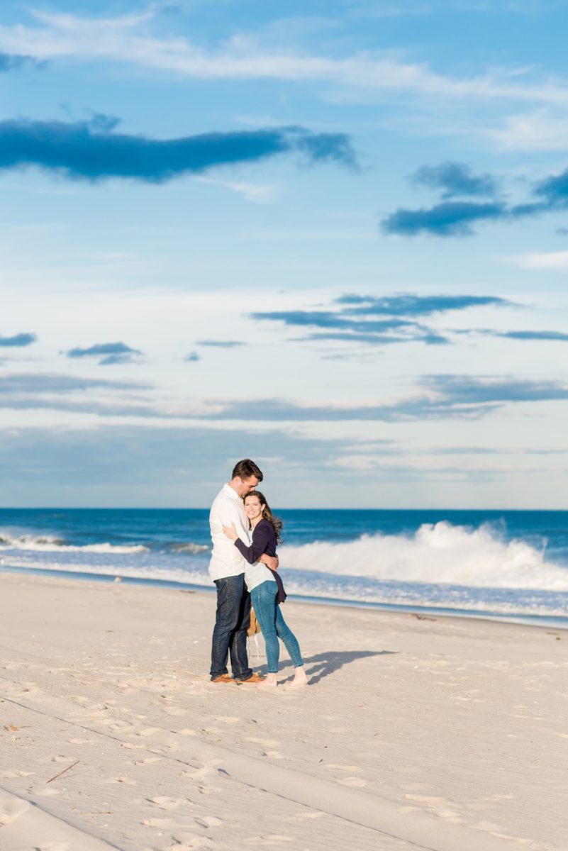 Beautiful Long Island engagement photos on the beach with a lighthouse. Mikkel Paige Photography captured the couple at Robert Moses state park in New York, just 40 minutes from NYC. #mikkelpaige #LongIslandEngagement #LongIslandBeachEngagement #Beachweddingphotos #LongIslandphotographer #LongIslandWeddingPhotographer