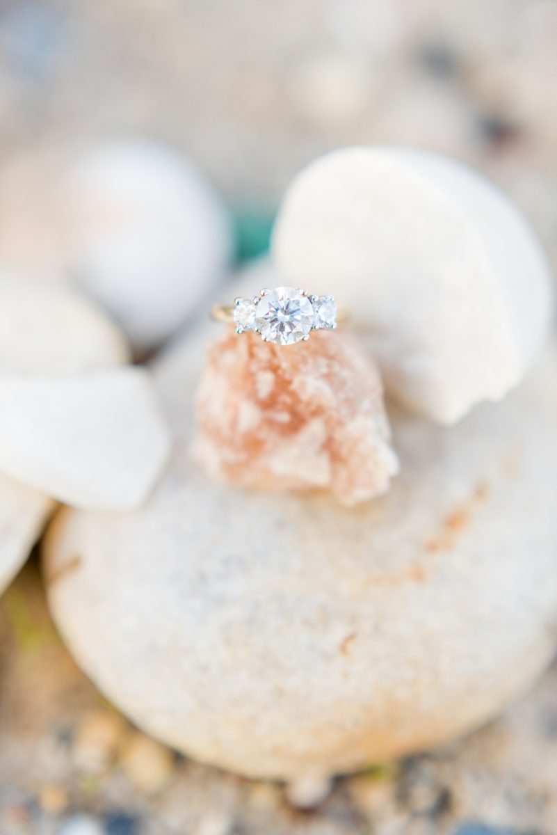 Beautiful Long Island engagement photos on the beach with a lighthouse. Mikkel Paige Photography captured the couple at Robert Moses state park in New York, just 40 minutes from NYC. #mikkelpaige #LongIslandEngagement #LongIslandBeachEngagement #Beachweddingphotos #LongIslandphotographer #LongIslandWeddingPhotographer #engagementring #threediamondengagementring