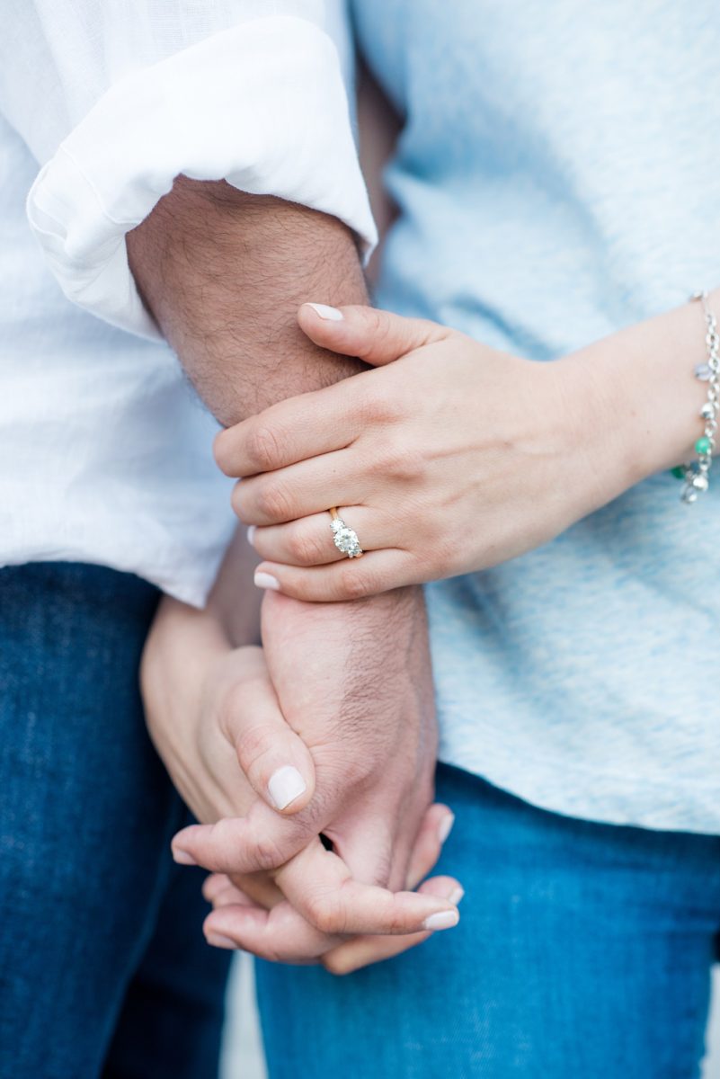 Beautiful Long Island engagement photos on the beach with a lighthouse. Mikkel Paige Photography captured the couple at Robert Moses state park in New York, just 40 minutes from NYC. #mikkelpaige #LongIslandEngagement #LongIslandBeachEngagement #Beachweddingphotos #LongIslandphotographer #LongIslandWeddingPhotographer #engagementring #threediamondengagementring