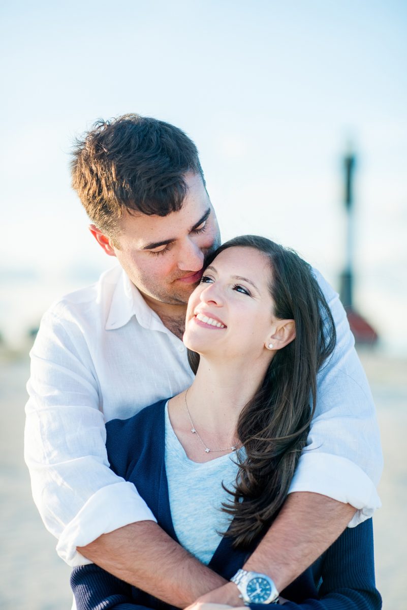 Beautiful Long Island engagement photos on the beach with a lighthouse. Mikkel Paige Photography captured the couple at Robert Moses state park in New York, just 40 minutes from NYC. #mikkelpaige #LongIslandEngagement #LongIslandBeachEngagement #Beachweddingphotos #LongIslandphotographer #LongIslandWeddingPhotographer