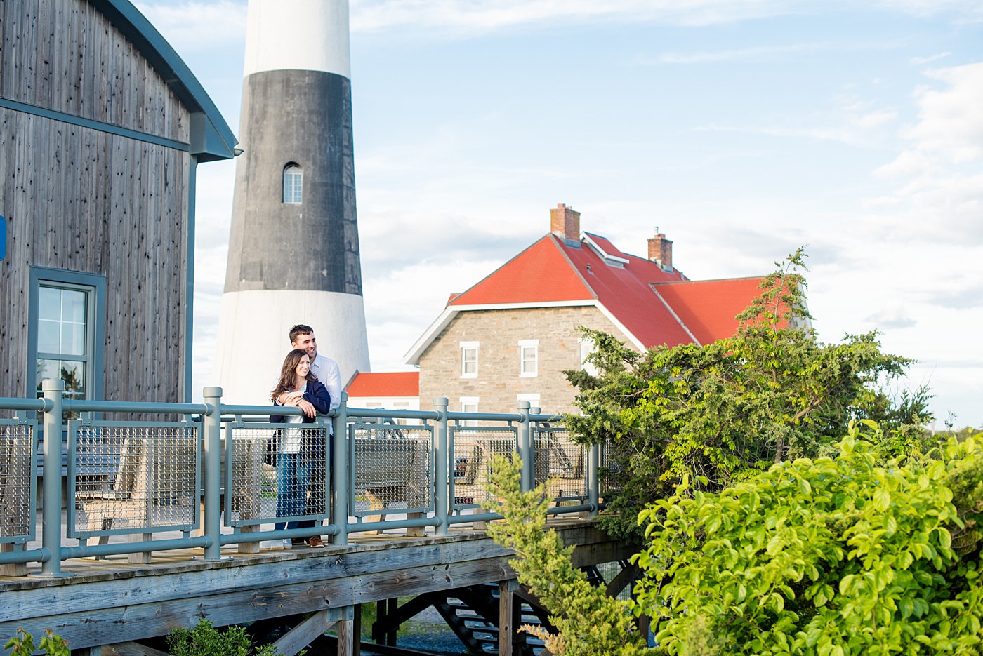 Beautiful Long Island engagement photos on the beach with a lighthouse. Mikkel Paige Photography captured the couple at Robert Moses state park in New York, just 40 minutes from NYC. #mikkelpaige #LongIslandEngagement #LongIslandBeachEngagement #Beachweddingphotos #LongIslandphotographer #LongIslandWeddingPhotographer