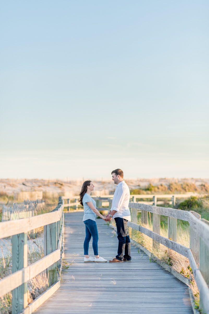 Beautiful Long Island engagement photos on the beach with a lighthouse. Mikkel Paige Photography captured the couple at Robert Moses state park in New York, just 40 minutes from NYC. #mikkelpaige #LongIslandEngagement #LongIslandBeachEngagement #Beachweddingphotos #LongIslandphotographer #LongIslandWeddingPhotographer