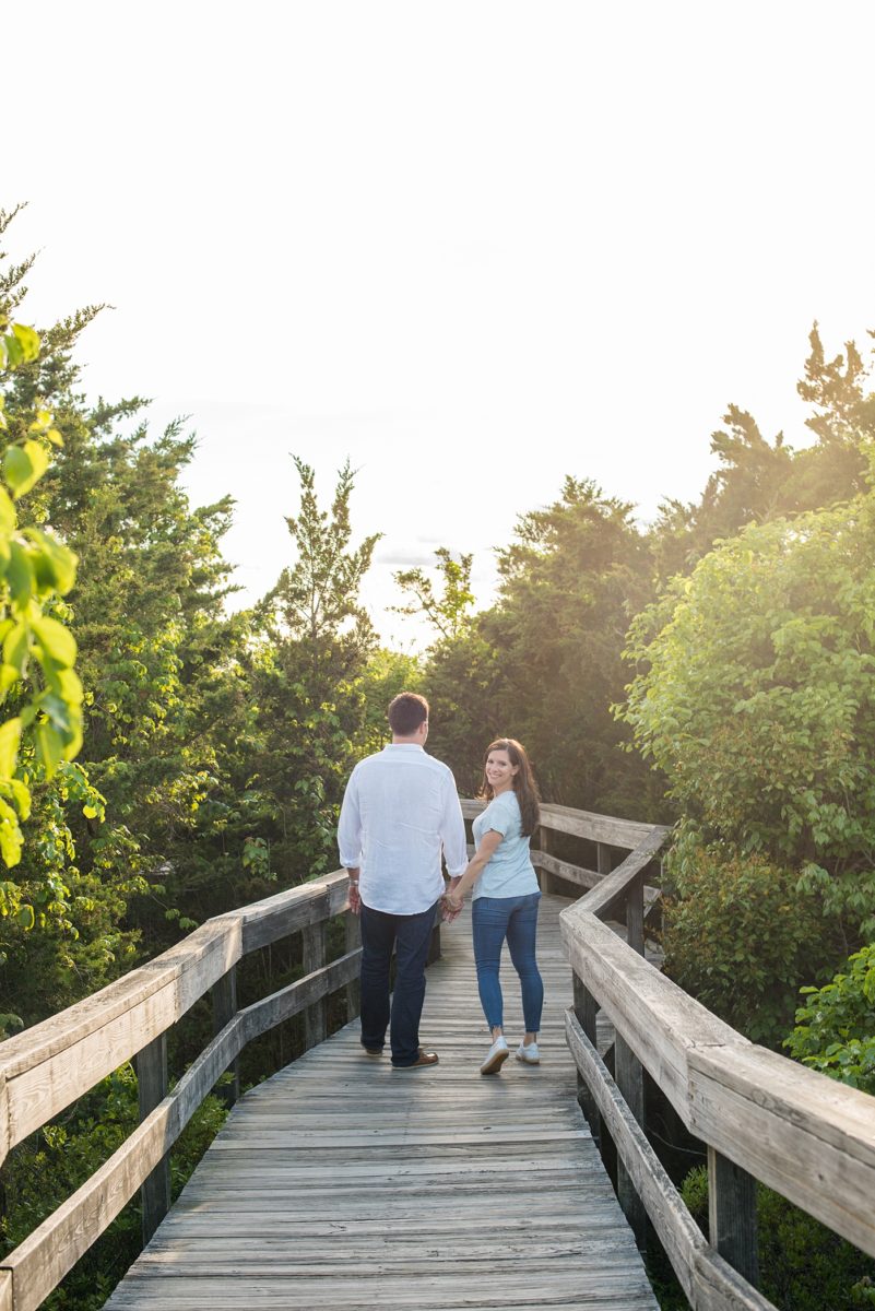 Beautiful Long Island engagement photos on the beach with a lighthouse. Mikkel Paige Photography captured the couple at Robert Moses state park in New York, just 40 minutes from NYC. #mikkelpaige #LongIslandEngagement #LongIslandBeachEngagement #Beachweddingphotos #LongIslandphotographer #LongIslandWeddingPhotographer