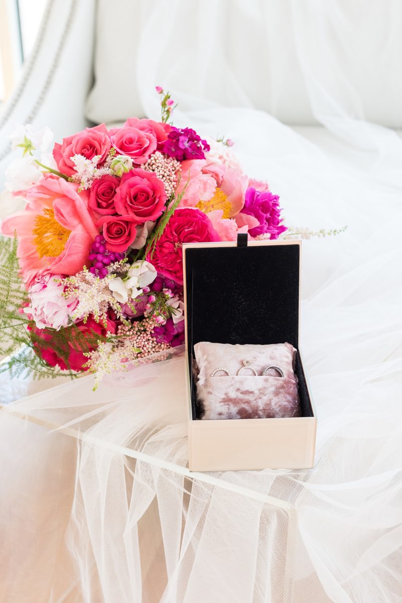 A beautiful spring wedding in downtown Raleigh, North Carolina, at the event venue, The Stockroom at 230 and The Glass Box. Their photographer, Mikkel Paige Photography, captured beautiful ring detail images and wedding portraits, and bridal pictures of their hot pink and aqua blue colors. #MikkelPaige #DowntownRaleigh #RaleighWedding #RaleighVenue #TheStockroomat230