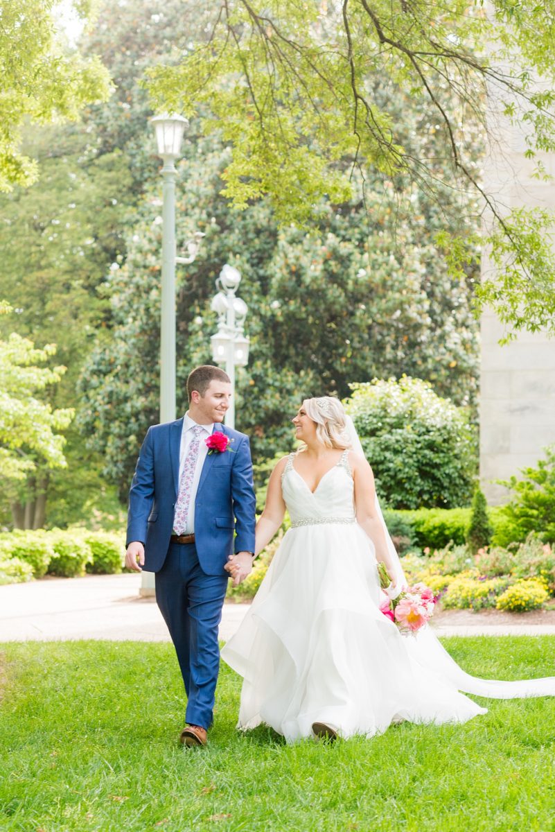 Beautiful spring wedding in downtown Raleigh, North Carolina, at the event venue The Stockroom at 230 and The Glass Box. Their photographer, Mikkel Paige Photography, captured inspiring bride and groom portraits at the capital building with a hot pink peony bouquet by The English Garden. #MikkelPaige #DowntownRaleigh #RaleighWedding #RaleighVenue #TheStockroomat230 #hayleypaige #bridestyle