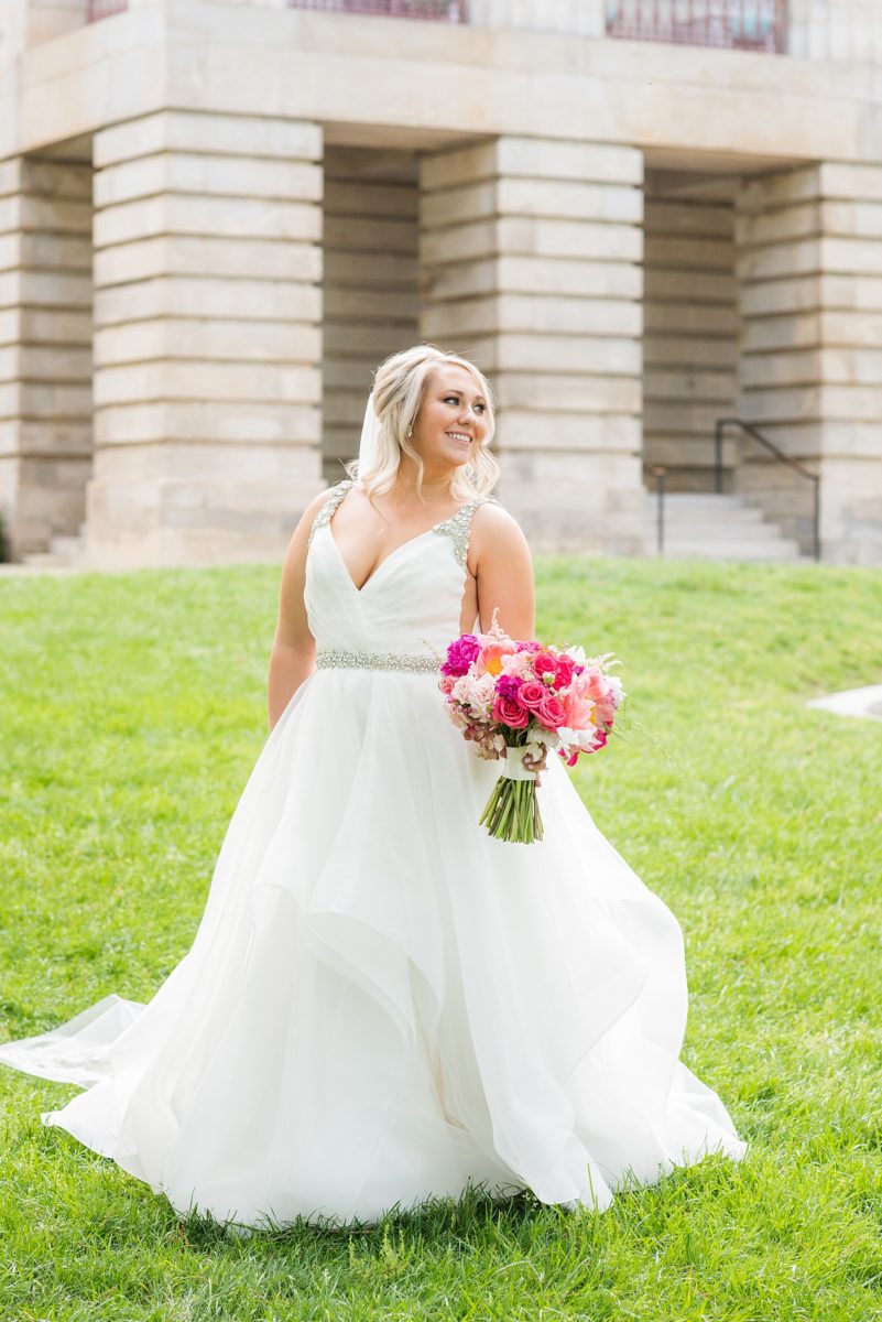 Beautiful spring wedding in downtown Raleigh, North Carolina, at the event venue The Stockroom at 230 and The Glass Box. Their photographer, Mikkel Paige Photography, captured inspiring bride and groom portraits at the capital building with a hot pink peony bouquet by The English Garden. #MikkelPaige #DowntownRaleigh #RaleighWedding #RaleighVenue #TheStockroomat230 #hayleypaige #bridestyle