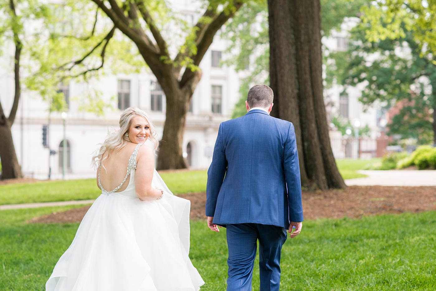 Beautiful spring wedding in downtown Raleigh, North Carolina, at the event venue The Stockroom at 230 and The Glass Box. Their photographer, Mikkel Paige Photography, captured inspiring bride and groom portraits at the capital building with a hot pink peony bouquet by The English Garden. #MikkelPaige #DowntownRaleigh #RaleighWedding #RaleighVenue #TheStockroomat230 #hayleypaige #bridestyle