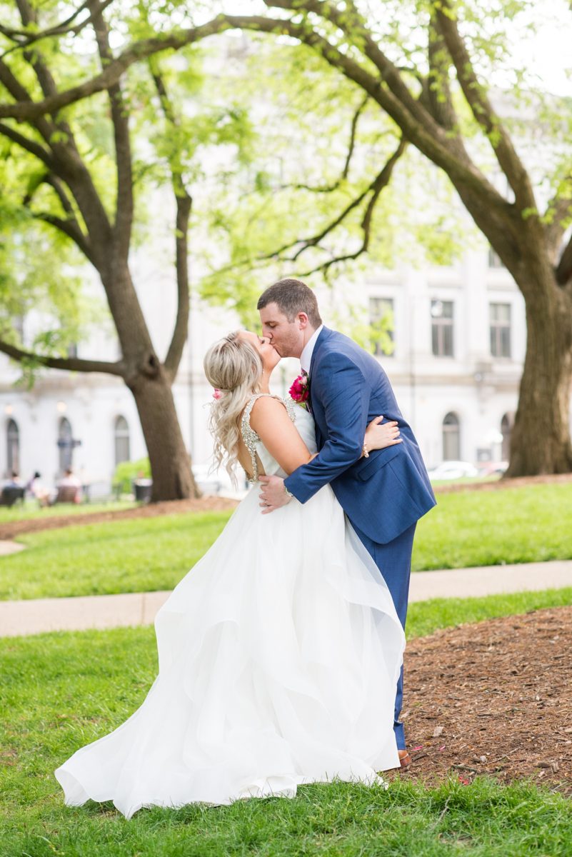 Beautiful spring wedding in downtown Raleigh, North Carolina, at the event venue The Stockroom at 230 and The Glass Box. Their photographer, Mikkel Paige Photography, captured inspiring bride and groom portraits at the capital building with a hot pink peony bouquet by The English Garden. #MikkelPaige #DowntownRaleigh #RaleighWedding #RaleighVenue #TheStockroomat230 #hayleypaige #bridestyle