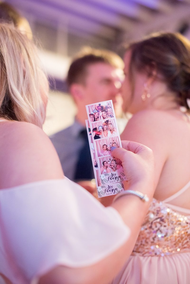 A beautiful spring wedding in downtown Raleigh, North Carolina, at the event venue The Stockroom at 230. Mikkel Paige Photography, their photographer, captured inspiring reception pictures of their hot pink and aqua blue colors. #MikkelPaige #DowntownRaleigh #RaleighWedding #RaleighVenue #TheStockroomat230 #weddingreception