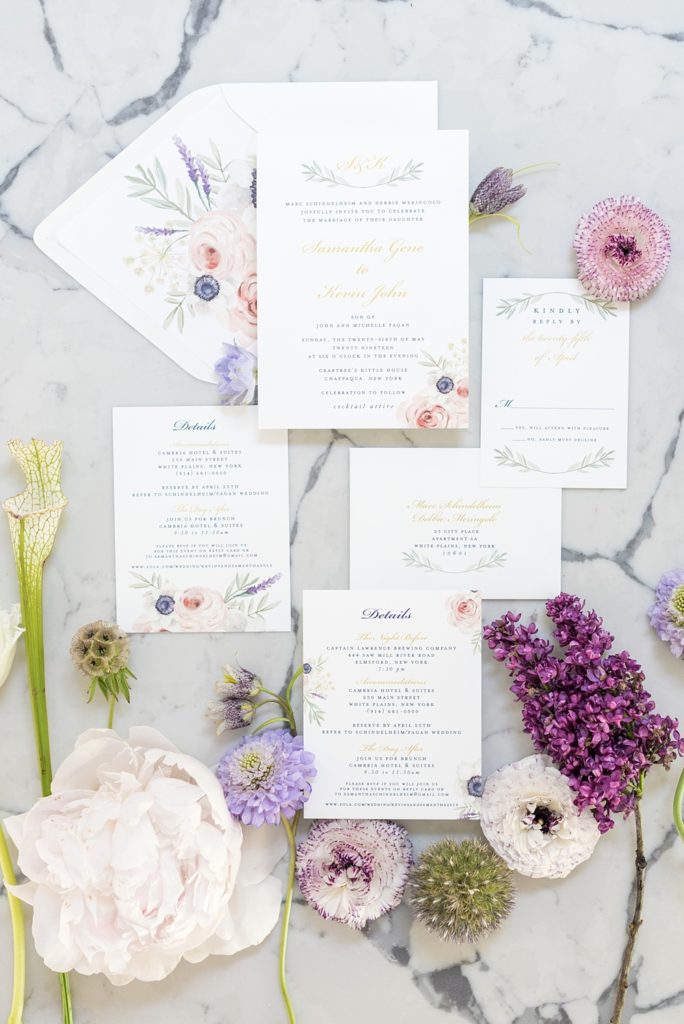 Westchester wedding photography at a beautiful outdoor and indoor venue called Crabtree's Kittle House. Photos by Mikkel Paige Photography. Their invitation was a classic style with watercolor flowers on the envelope liner. #mikkelpaige #westchestervenue #westchesterphotography #crabtreeskittlehouse #weddingstationery #watercolorflowers