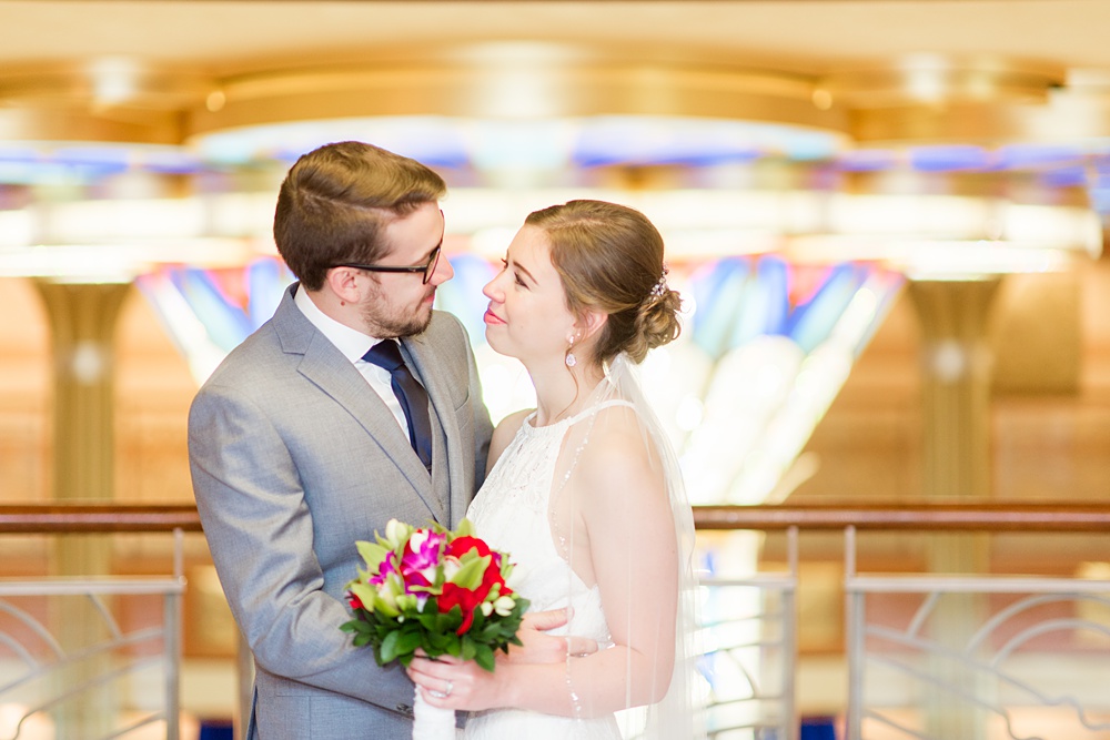 Disney Cruise Line wedding photos on Castaway Cay and the Disney Dream ship by Mikkel Paige Photography. This fairy tale wedding make the bride and groom's dream come true to get married in a fun location, spotlighting their love for the brand. #mikkelpaige #disneywedding #disneyfairytalewedding #disneycruiseline #disneycruiselinewedding #disneydream #cruisewedding #disneyweddingpackage