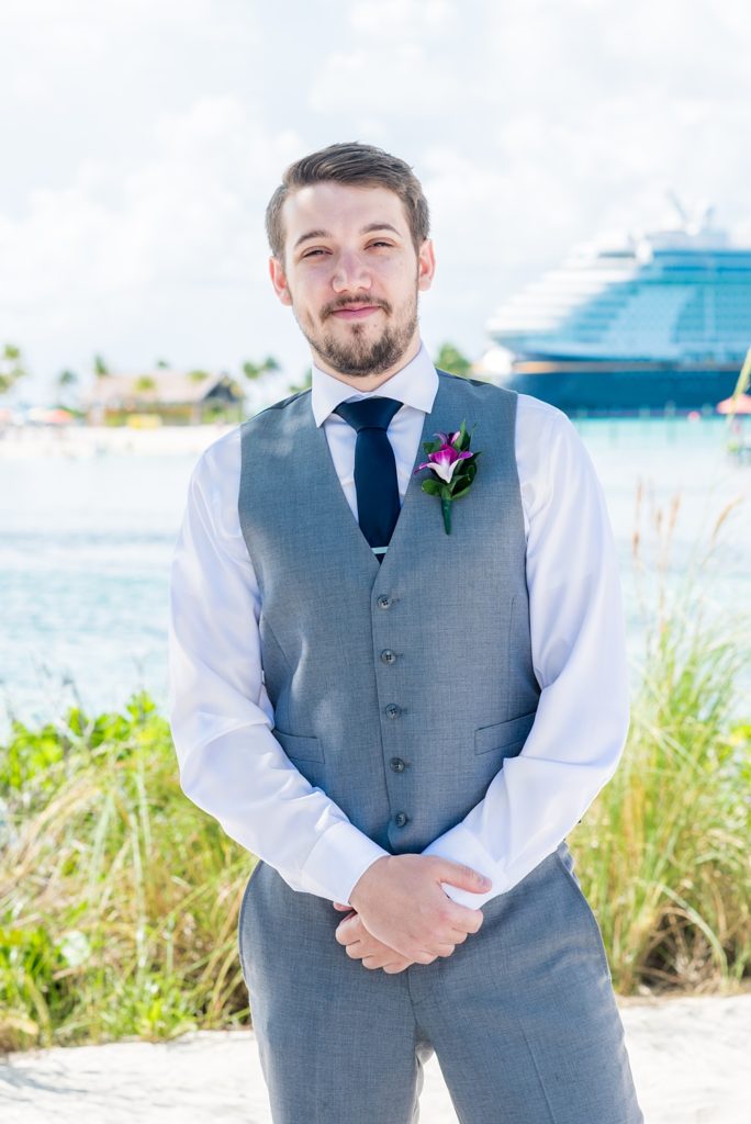 Disney Cruise Line wedding photos on Castaway Cay and the Disney Dream ship by Mikkel Paige Photography. This fairy tale wedding make the bride and groom's dream come true to get married in a fun location, spotlighting their love for the brand. #mikkelpaige #disneywedding #disneyfairytalewedding #disneycruiseline #disneycruiselinewedding #disneydream #cruisewedding #disneyweddingpackage