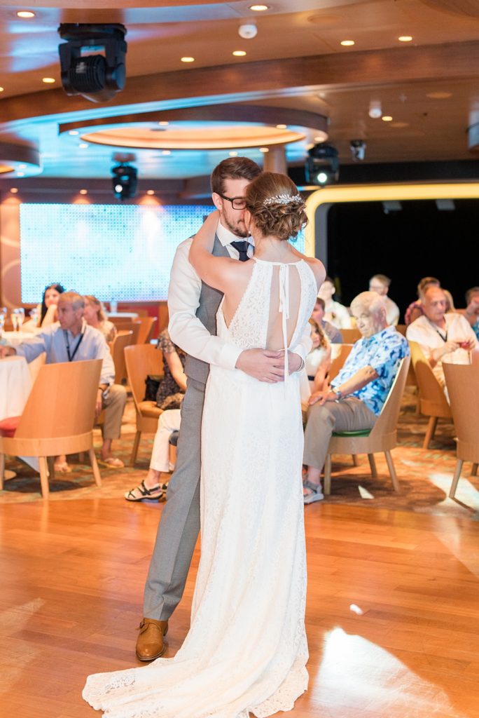 Disney Cruise Line destination wedding photos on Castaway Cay and the Disney Dream ship by Mikkel Paige Photography. This fairy tale wedding make the bride and groom's dream come true to get married in a fun location, spotlighting their love for the brand. Their reception was in the D Lounge with Fairy Tale Celebration champagne and a white fondant cake. #mikkelpaige #disneywedding #disneyfairytalewedding #disneycruiseline #disneycruiselinewedding #disneydream #cruisewedding