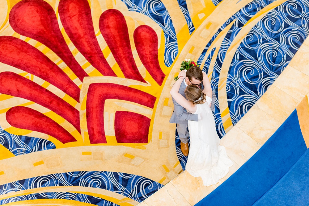 Disney Cruise Line destination wedding photos on Castaway Cay and the Disney Dream ship by Mikkel Paige Photography. This fairy tale wedding make the bride and groom's dream come true to get married in a fun location, spotlighting their love for the brand. #mikkelpaige #disneywedding #disneyfairytalewedding #disneycruiseline #disneycruiselinewedding #disneydream #cruisewedding