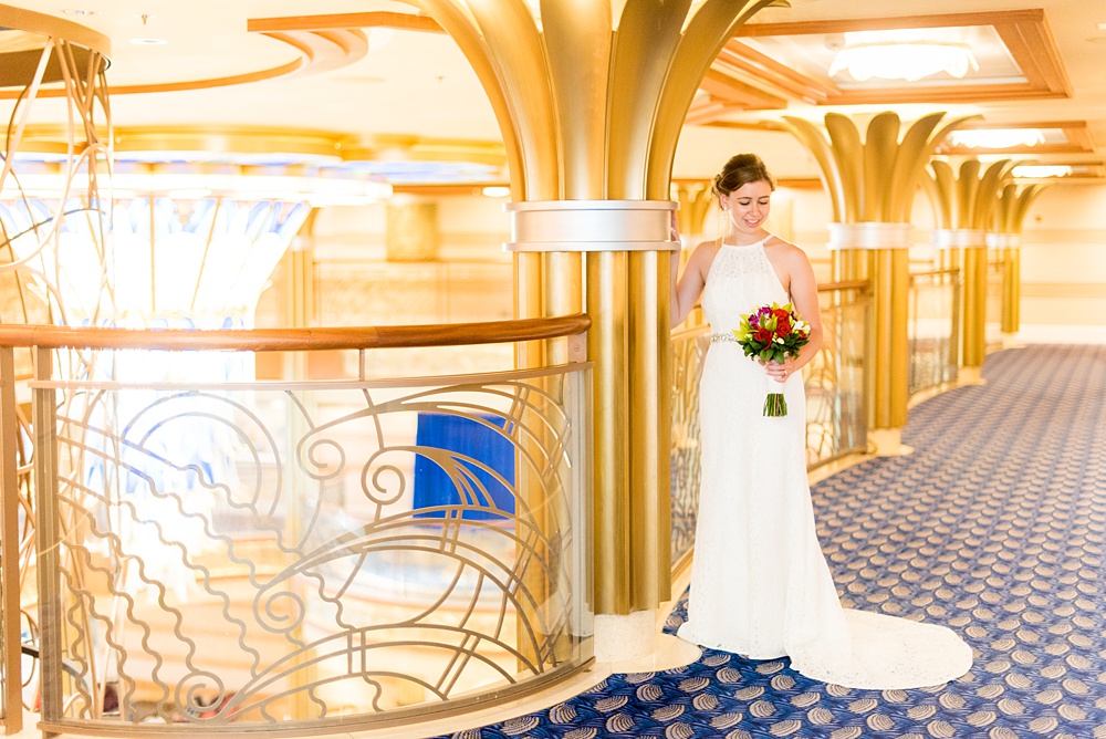 Disney Cruise Line destination wedding photos on Castaway Cay and the Disney Dream ship by Mikkel Paige Photography. This fairy tale wedding make the bride and groom's dream come true to get married in a fun location, spotlighting their love for the brand. #mikkelpaige #disneywedding #disneyfairytalewedding #disneycruiseline #disneycruiselinewedding #disneydream #cruisewedding #velvetringbox