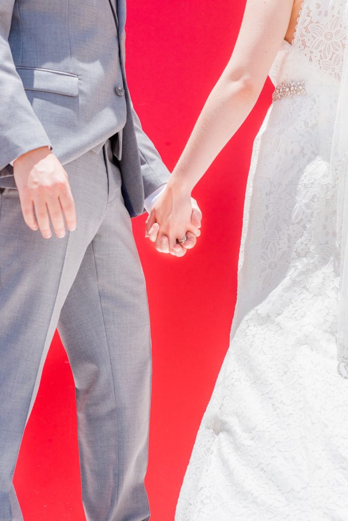 Disney Cruise Line destination wedding photos on Castaway Cay and the Disney Dream ship by Mikkel Paige Photography. This fairy tale wedding make the bride and groom's dream come true to get married in a fun location, spotlighting their love for the brand. #mikkelpaige #disneywedding #disneyfairytalewedding #disneycruiseline #disneycruiselinewedding #disneydream #cruisewedding #velvetringbox