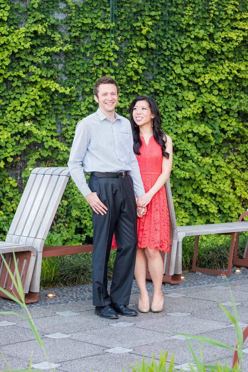 New York City pictures with a beautiful, fun couple with modern style. From a classic round diamond ring to sweet kisses with the Manhattan Skyline, Mikkel Paige Photography took them around western, lower NYC photographing their love at Google headquarters and Washington Square Park for engagement photos. #MikkelPaige #NYCengagementphotos #NewYorkCityEngagementPhotos #NYCengagementpictures