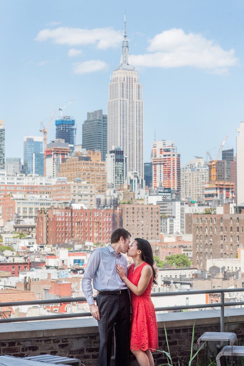 New York City pictures with a beautiful, fun couple with modern style. From a classic round diamond ring to sweet kisses with the Manhattan Skyline, Mikkel Paige Photography took them around western, lower NYC photographing their love at Google headquarters and Washington Square Park for engagement photos. #MikkelPaige #NYCengagementphotos #NewYorkCityEngagementPhotos #NYCengagementpictures